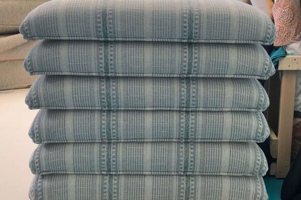 Pile of blue striped cushions
